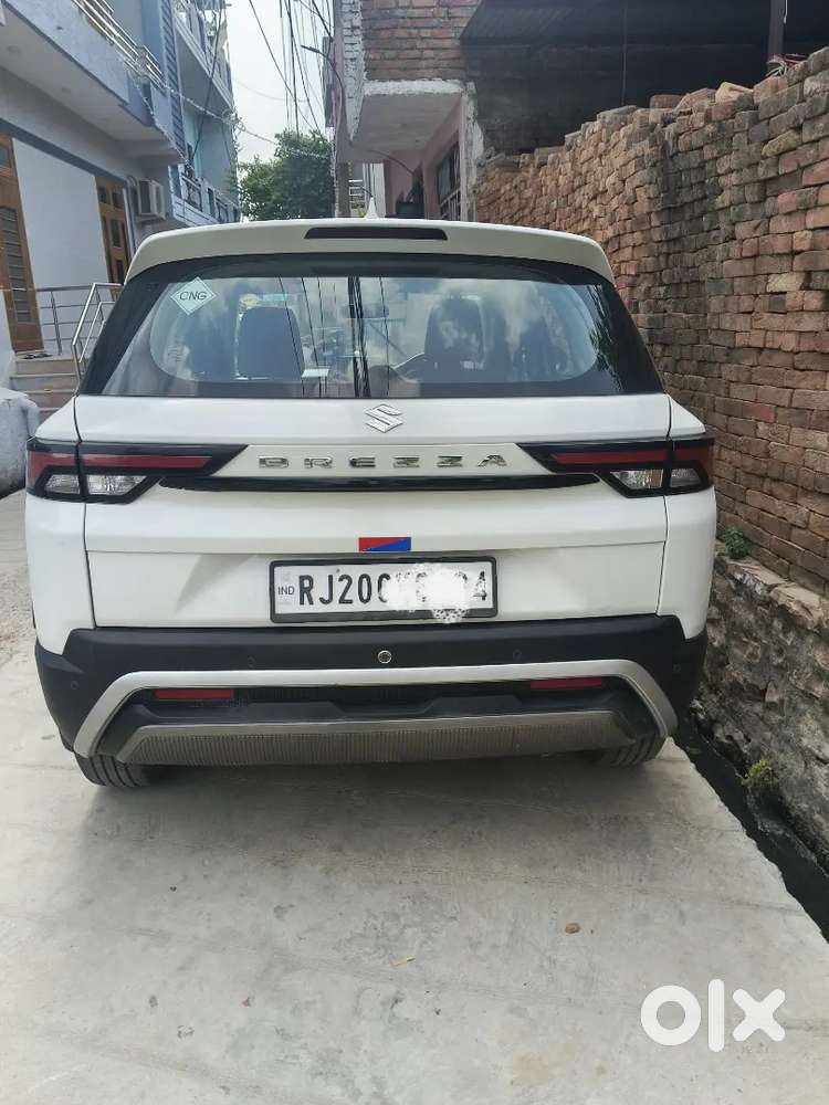 Maruti Suzuki Brezza Lxi 2025 With Low Km