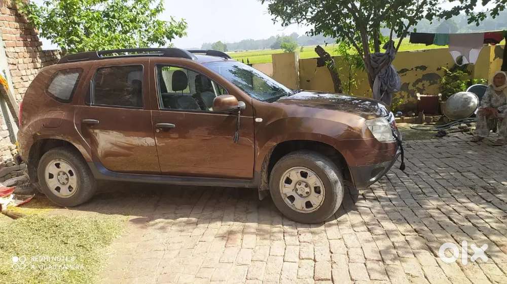 Renault Duster 2013 Diesel Brown Color 4×2 Asking Price 2,35,000