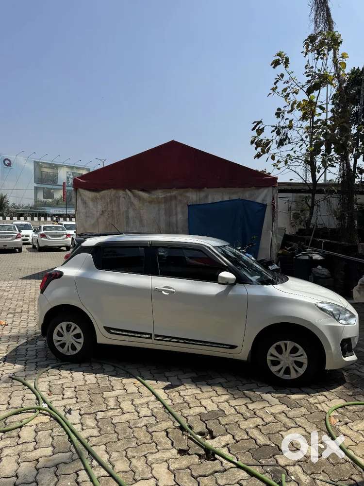 Swift Vxi
 White
 43km
Excellent Condition
Power Window
Power Steerin