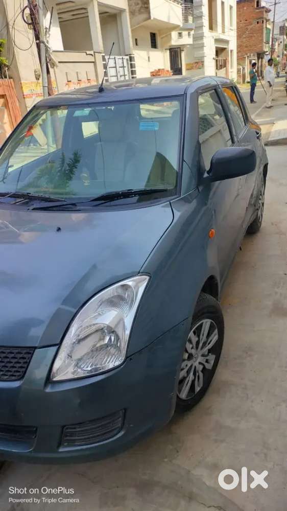 Maruti Suzuki Swift Lxi 2011