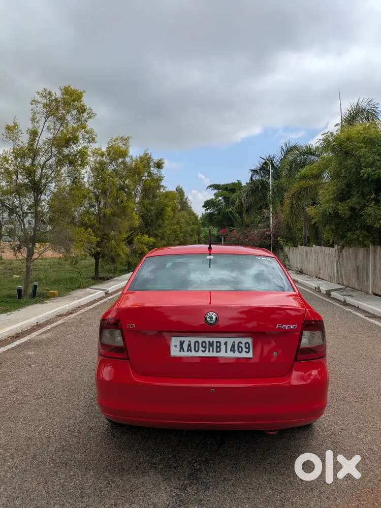 Skoda Rapid 2014 ,red Colour ,diesel Well Maintained