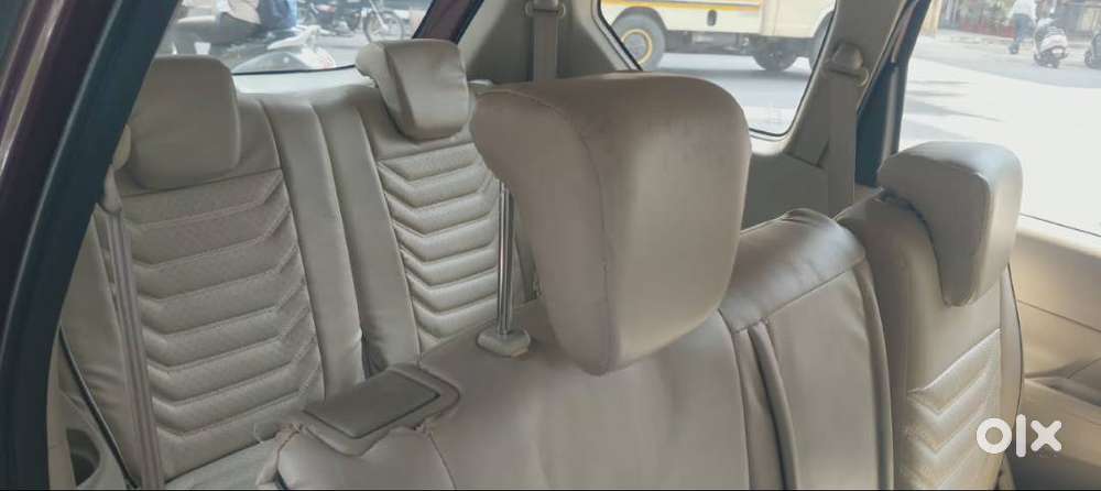 Ertiga Smart Hybrid Vxi (o) , Colour -prme. Auburn Red