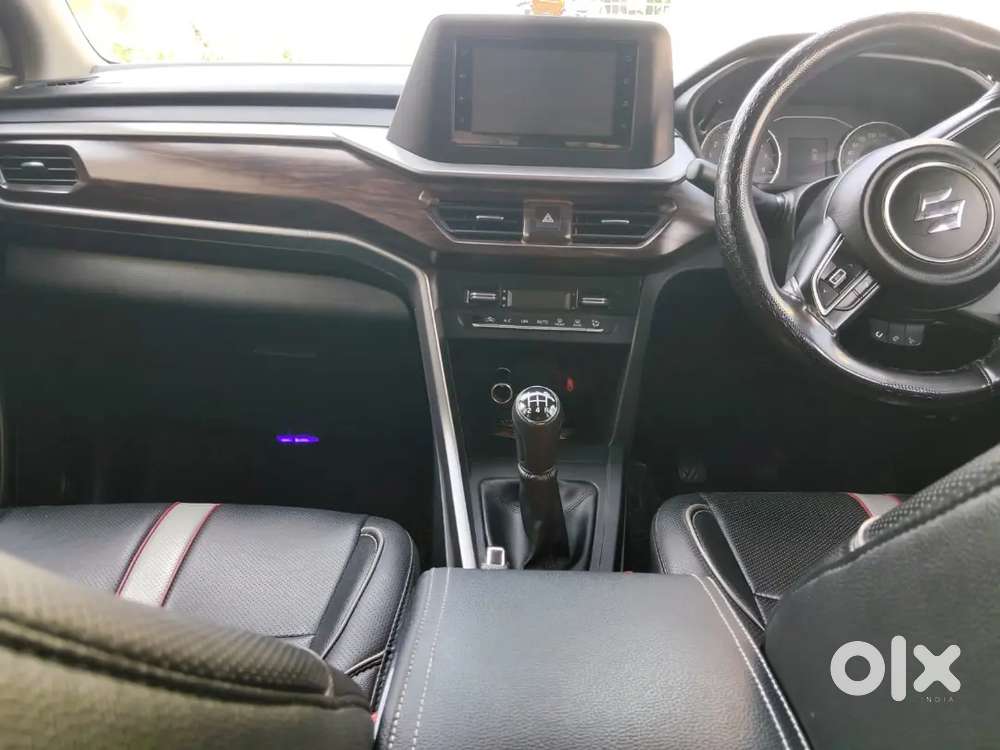 Maruti Brezza Vxi 2024