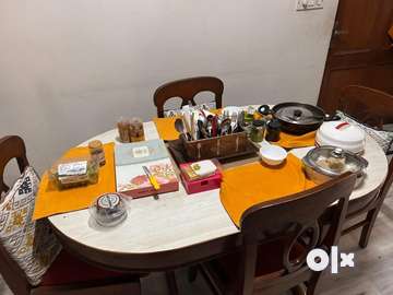 Olx dining table on sale and chairs