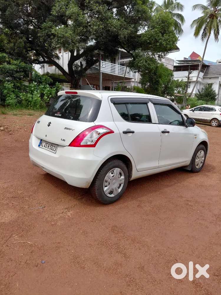 2013 Swift Petrol 2nd Owner 93000km