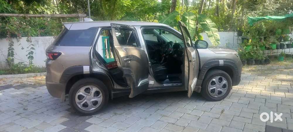 Maruti Suzuki Brezza Vxi 2024