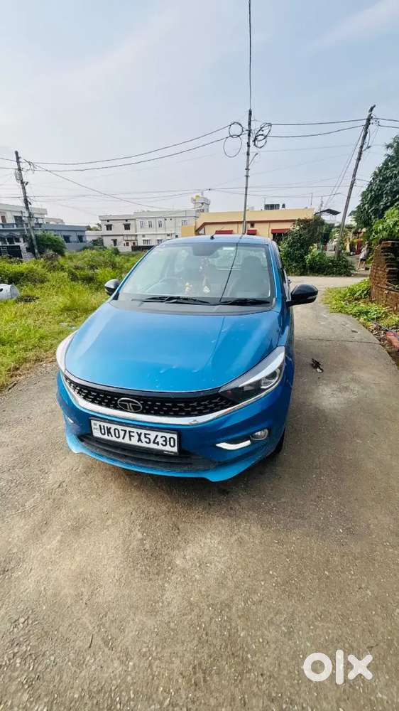 This Is The Top Model Tata Tiago  It's A New Car Driveen Only 9000 Km
