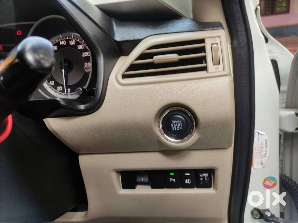 Dzire Zxi With Star Stop Button And Alloy Wheels And Keyless Entry