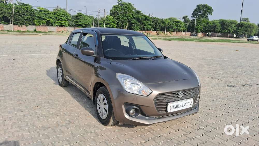Maruti Suzuki Swift 1.2 Lxi (o), 2023, Petrol