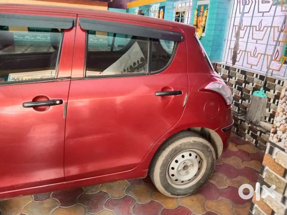 Maruti Suzuki Swift Lxi 2014