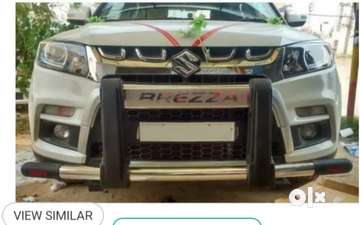 Brezza front store bumper guard