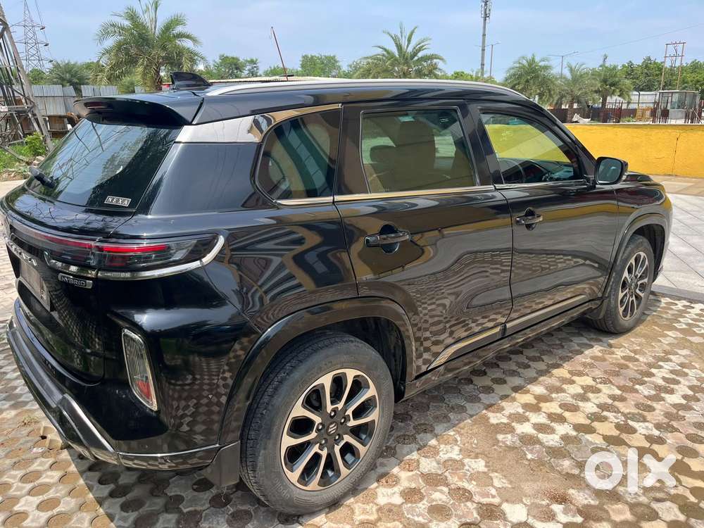 Maruti Suzuki Grand Vitara 1.5 Zeta Plus Dual Tone Intelligent Hybri..