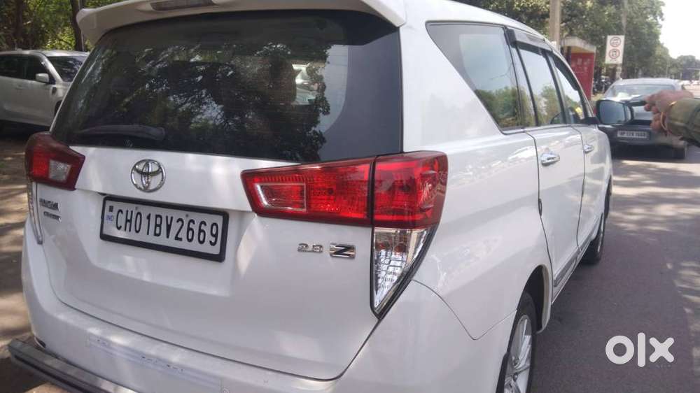 Innova Crysta ,white,top Model,2.8,z,at