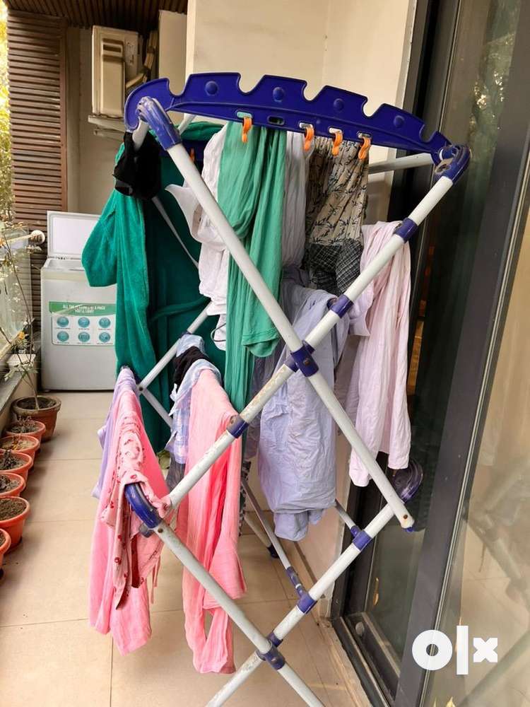 Olx cloth drying online stand