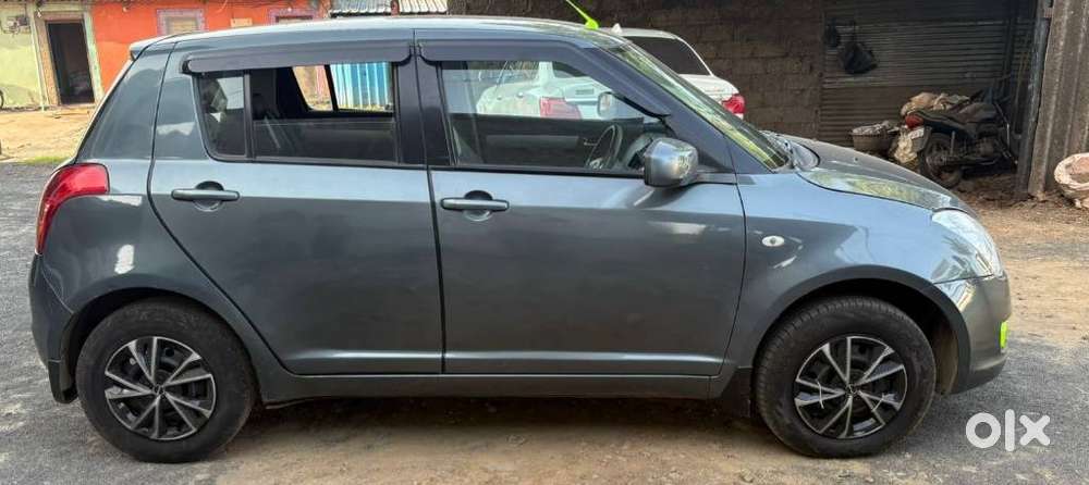 Maruti Suzuki Swift 1.2 Vxi (o), 2011, Petrol