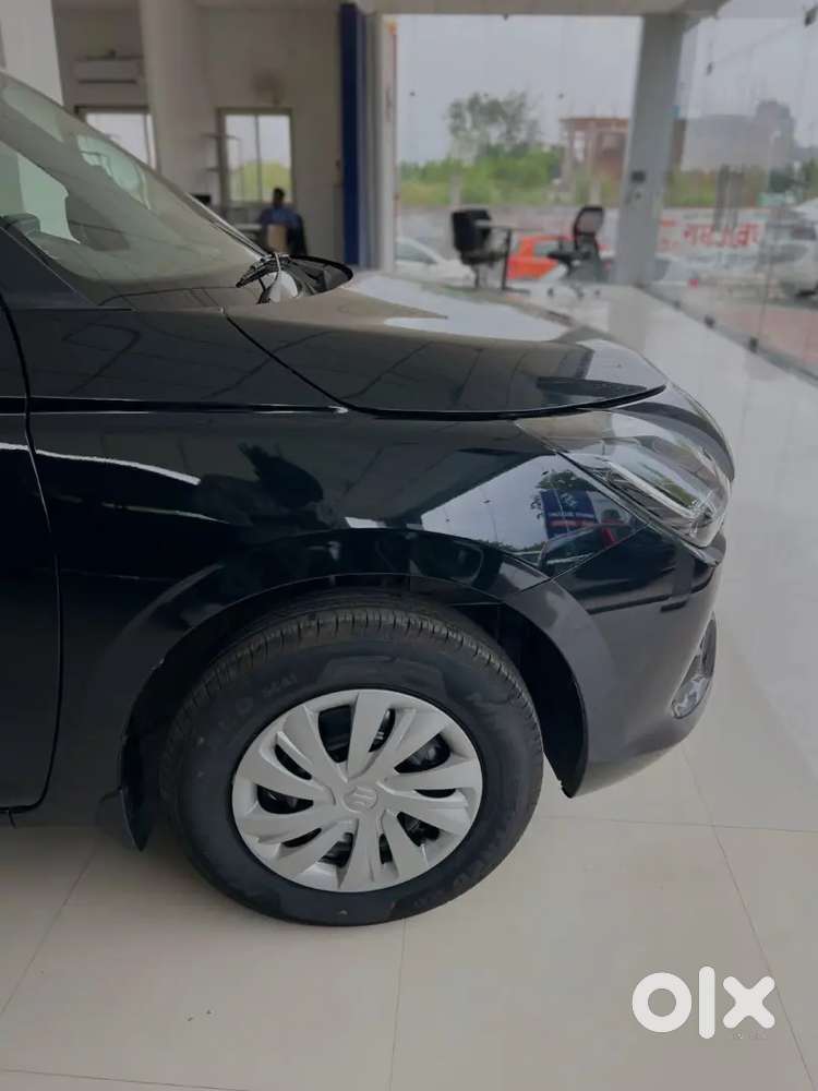 Maruti Suzuki Swift Vxi 2026