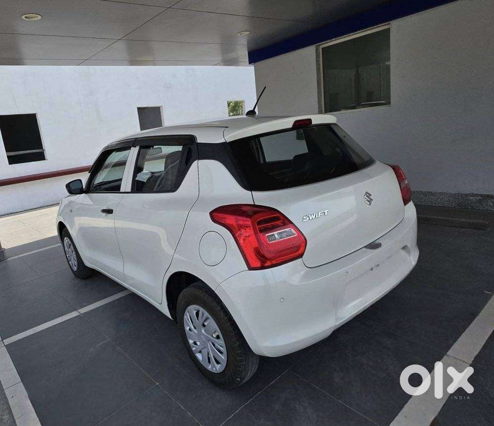 Maruti Suzuki Swift 1.2 Lxi (o), 2024, Petrol