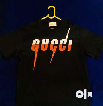 Olx t store shirt gucci