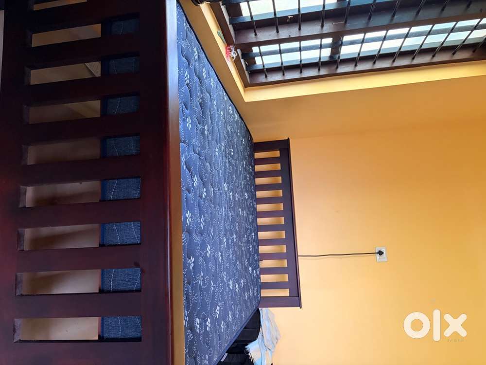 6/3 Teakwood Queen size bed with mattress barely used.