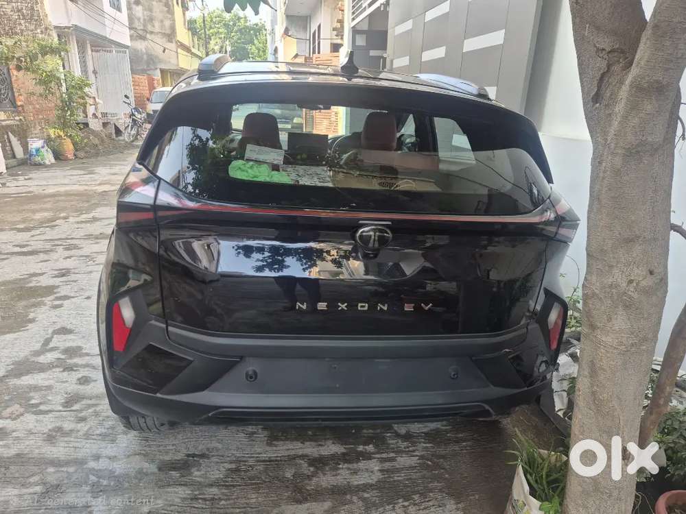 Tata Nexon Ev 2025 Empowered Plus 45 Kw Red Dark Edition