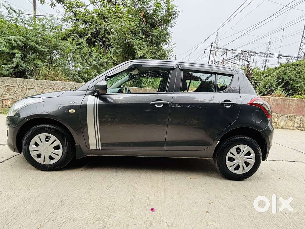 Maruti Suzuki Swift Lxi Optional-o, 2017, Petrol