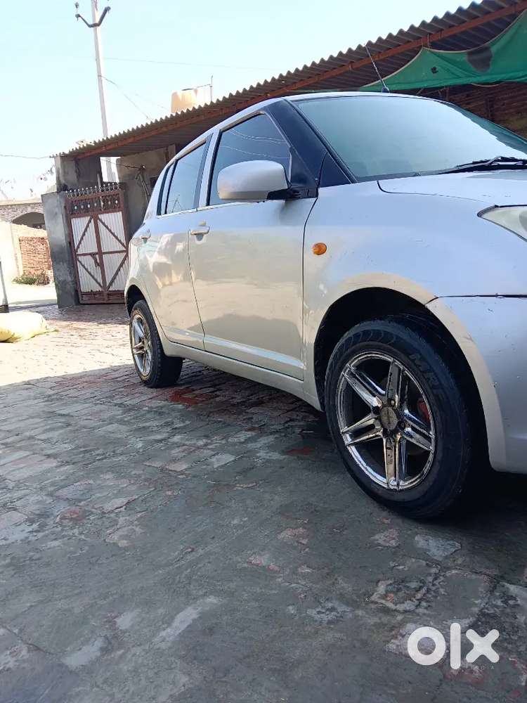 Maruti Suzuki Swift Lxi 2011