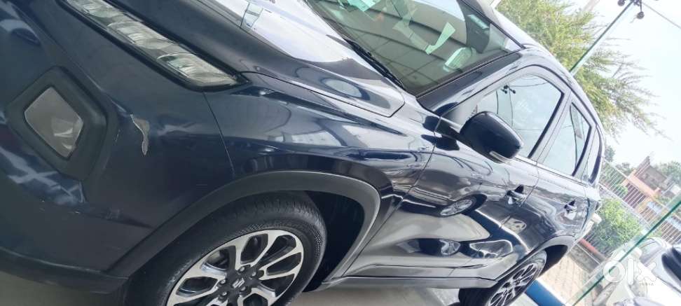 Maruti Suzuki Grand Vitara 1.5 Zeta Plus Dual Tone Intelligent Hybri..