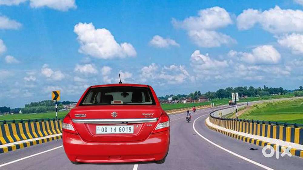 Red Hot Deal - Drive Home The Red Beauty – Swift Dzire Awaits You