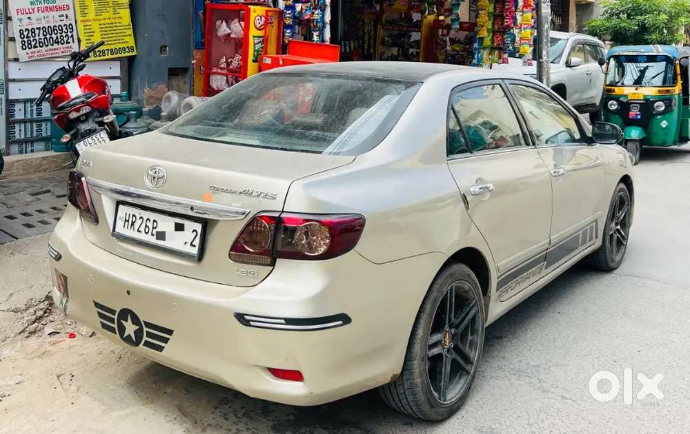 Toyota Corolla Altis 2013 Petrol + Cng Well Maintained Modified.