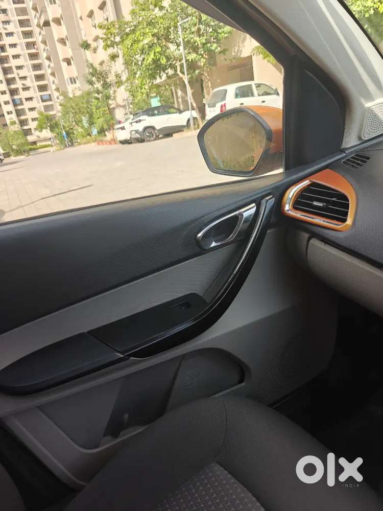 Tata Tiago 2018 Xza In Sunburst Orange With First Party Insurance