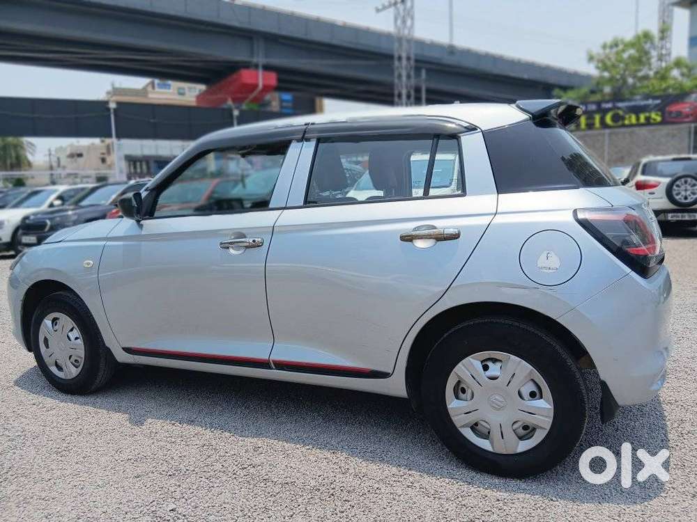 Maruti Suzuki Swift 1.2 Lxi (o), 2024, Petrol