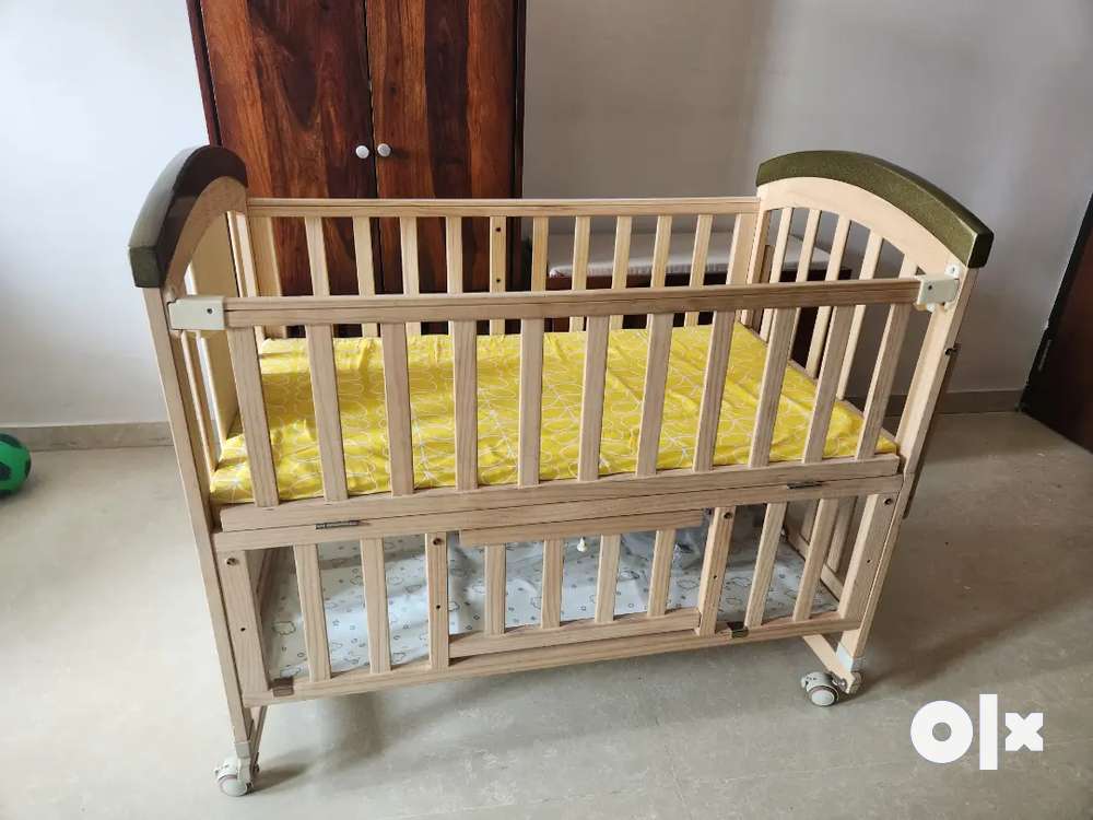 Olx cheap baby cot