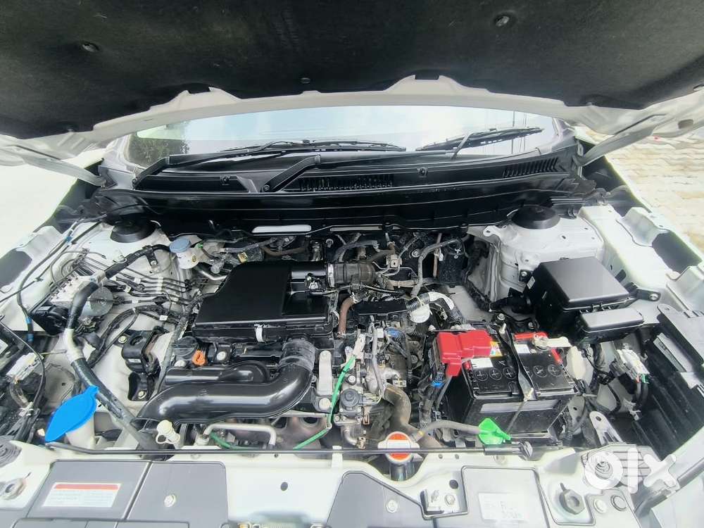 Maruti Suzuki Brezza 1.5 Vxi Smart Hybrid, 2024, Petrol