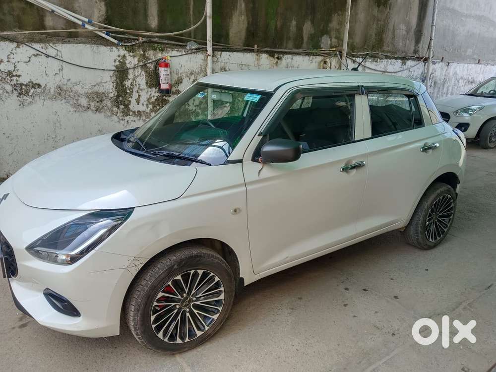 Maruti Suzuki Swift Lxi Optional-o, 2024, Petrol