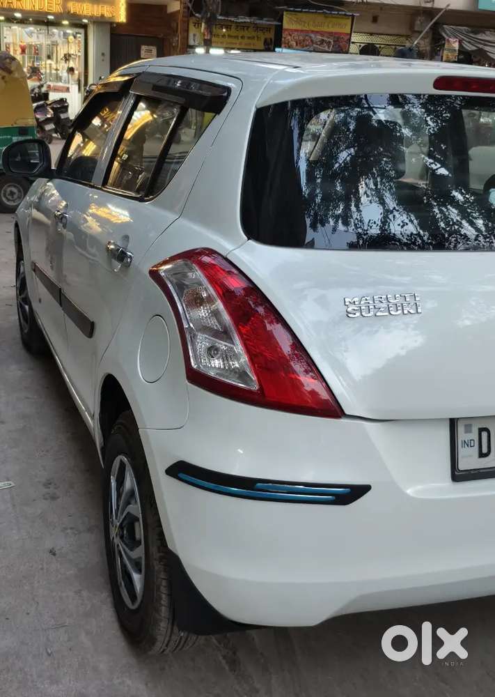 Maruti Suzuki Swift 1.2 Lxi Optional 2017