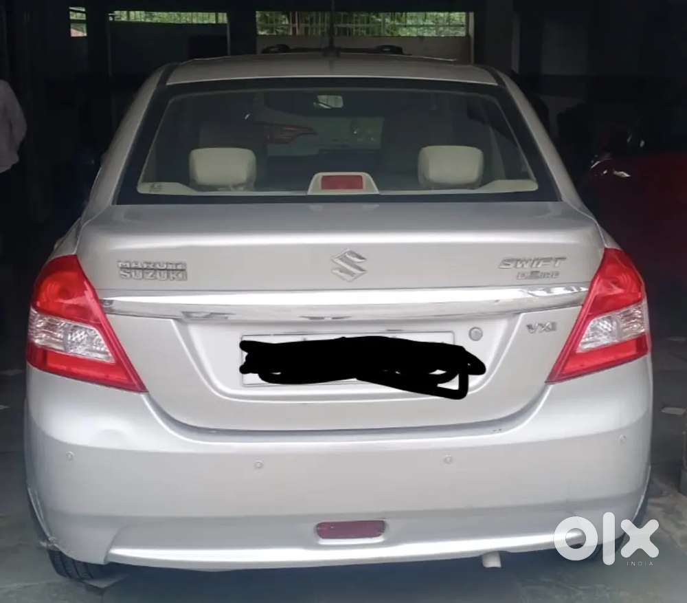 Maruti Suzuki Dzire 2014 Petrol Variant Cng Outside Fitted