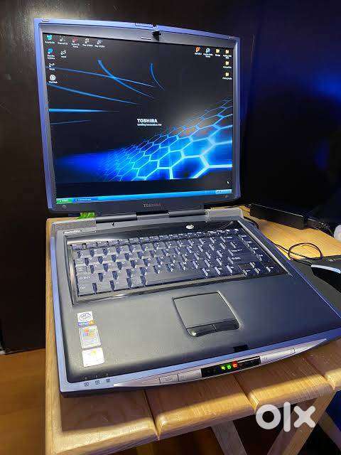 4 toshiba Windows XP Laptop Need Repairs