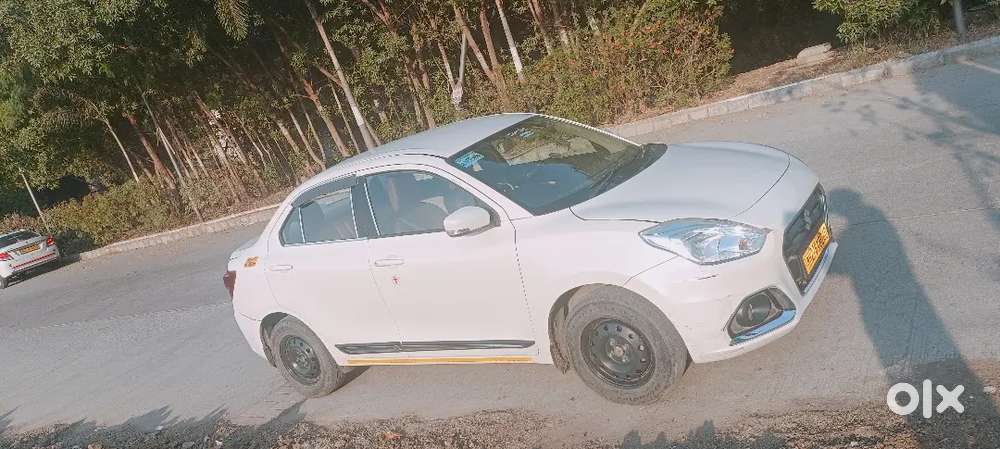 Dzire Vxi Out Side Fetted Cng Yellow Plete