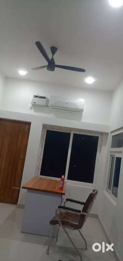Office chair, table,fan and AC