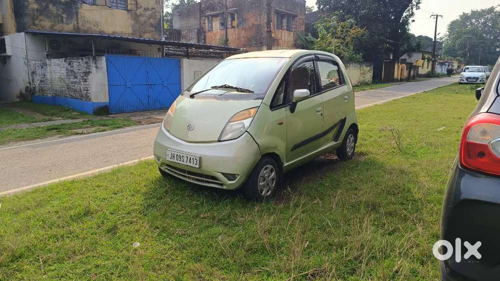 Tata Nano Lx 2012 Magenta Green Colour