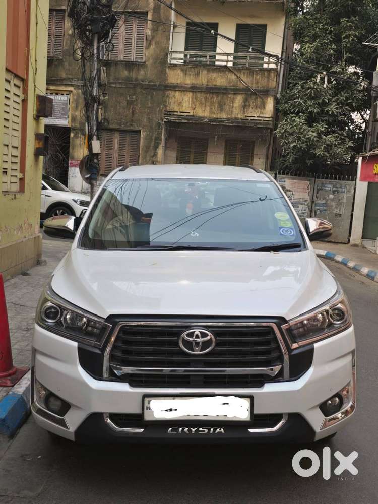 Innova Crysta 11 Months Old Pearl White