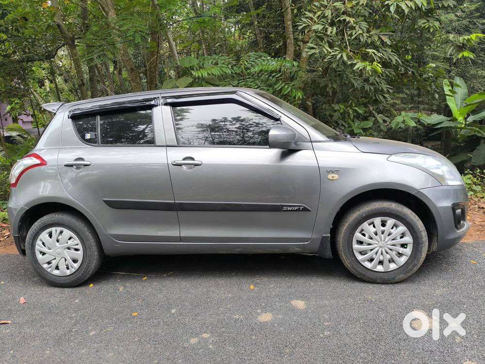 Maruti Suzuki Swift Lxi Optional-o, 2015, Petrol