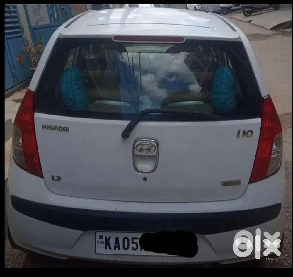 Hyundai I10/ 2009/petrol/white/92,000 Kms/ Call (8x1x2x3x1x3x8x8x2x1)