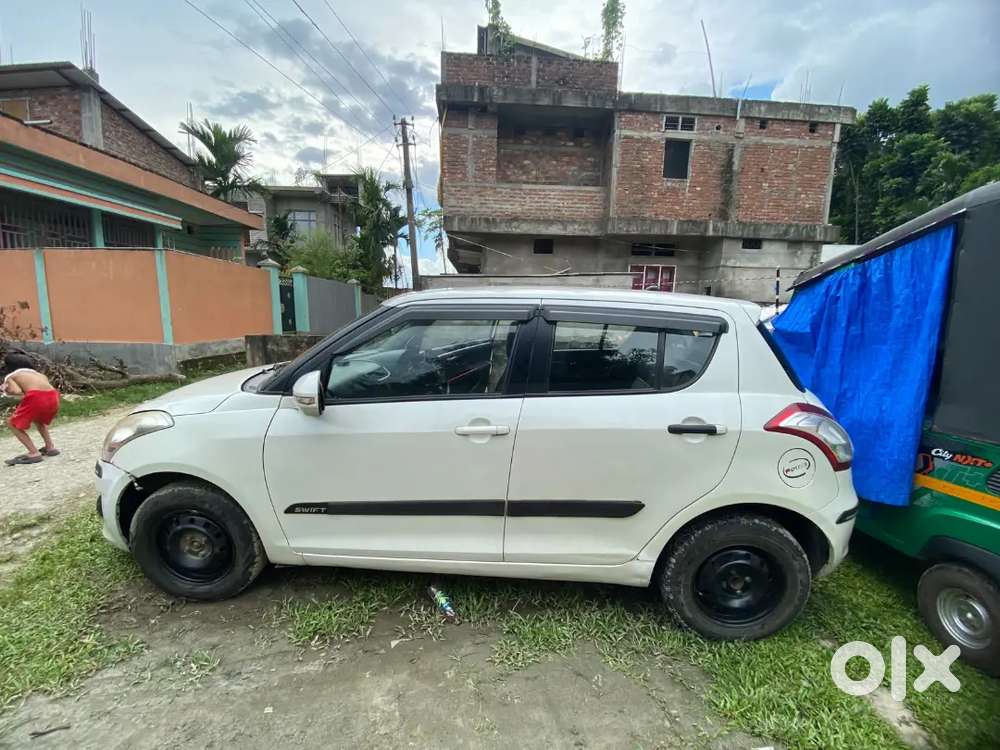 Maruti Suzuki Swift Lxi 2014