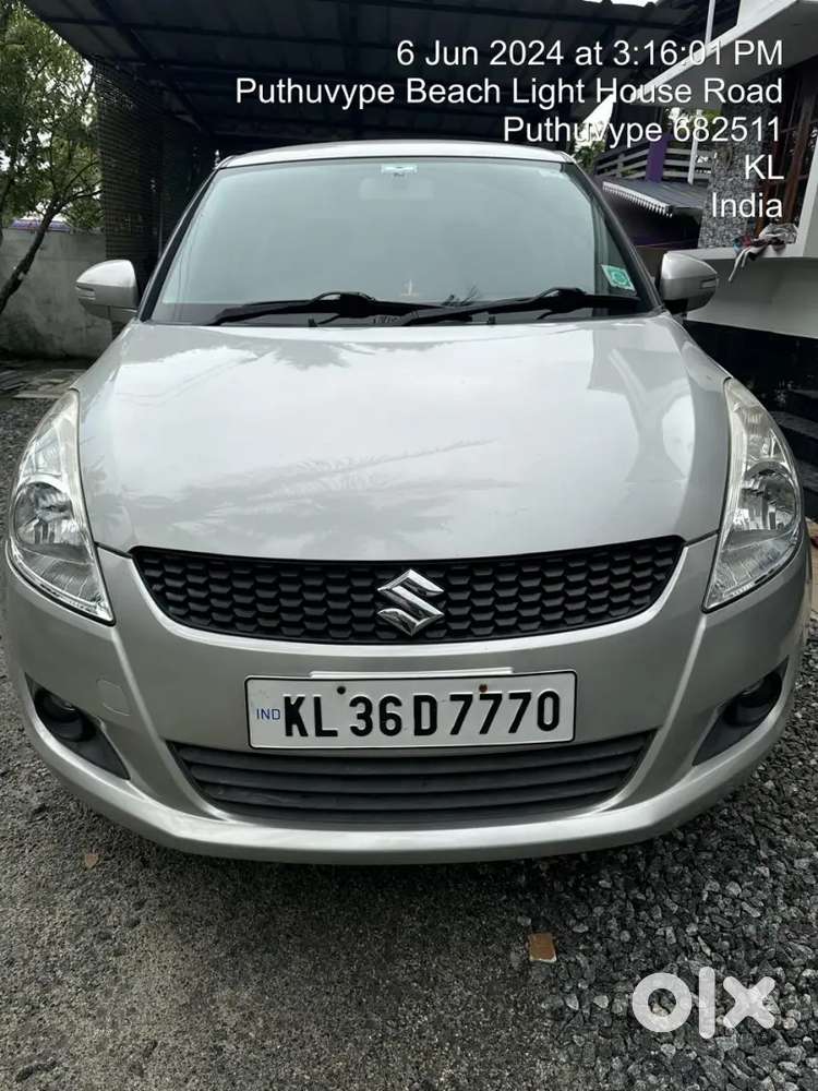 Maruti Suzuki Swift Lxi 2014