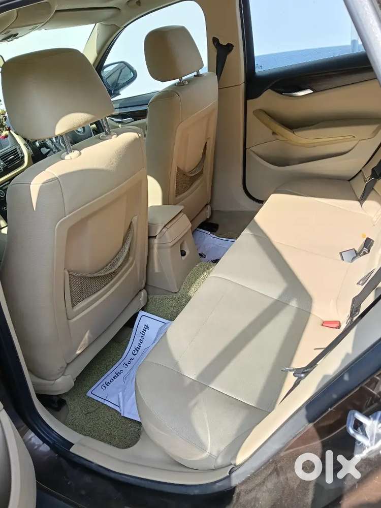 Bmw X1 2015  Rs.12,50,000/-  Registration Brown Colour 2nd Owner