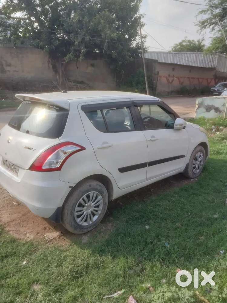 Maruti Suzuki Swift Lxi 2014