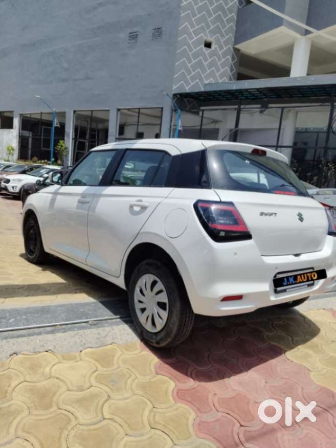 Maruti Suzuki Swift 1.2 Vxi (o), 2024, Petrol