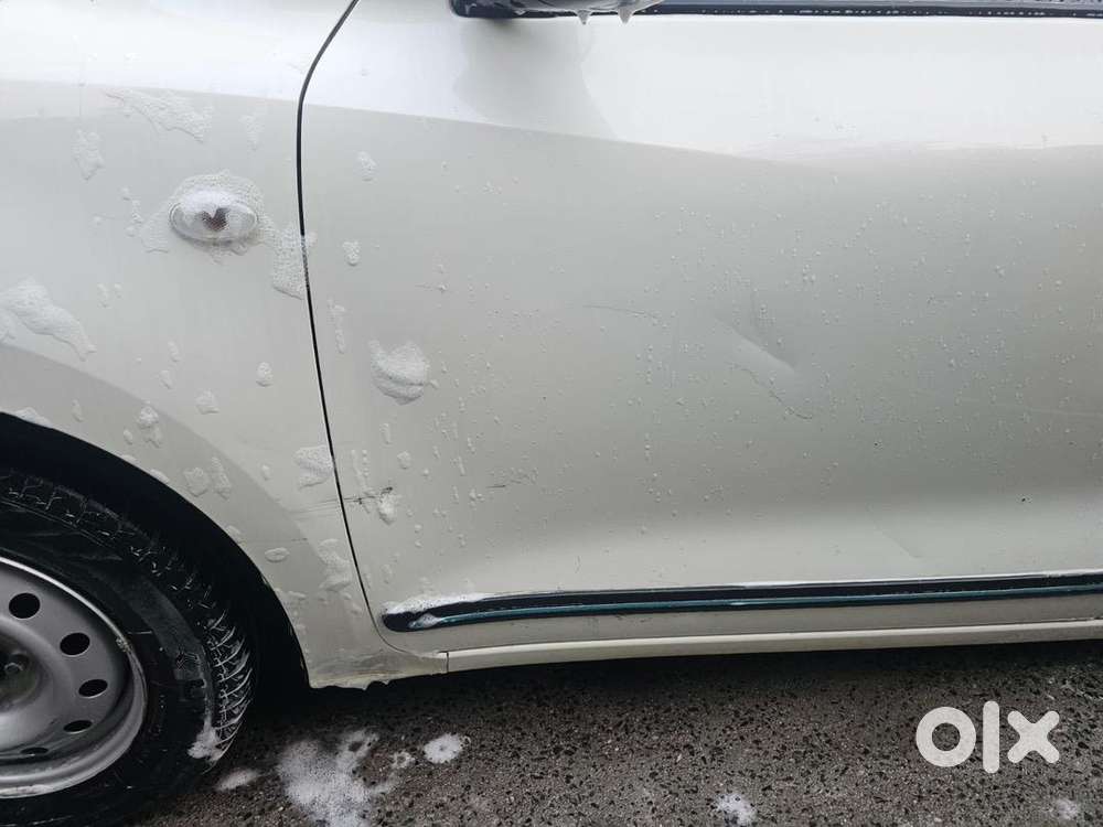Swift , 2022, Petrol , White Color , 23200km Driven ,