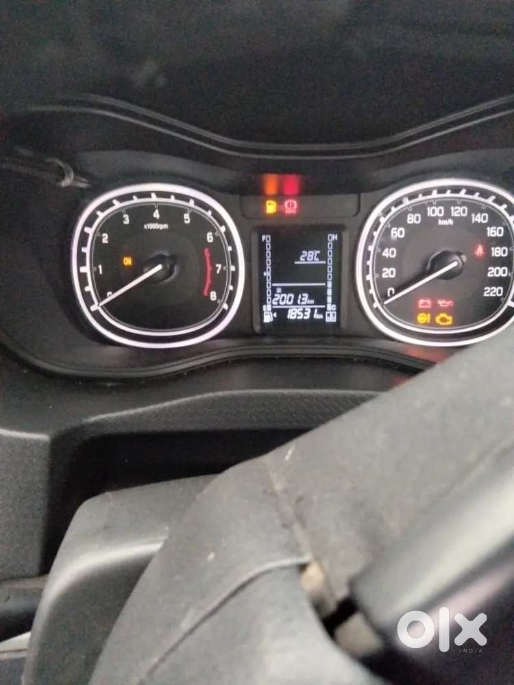 Brezza Zxi Car 18500 Km Driven Only